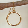 GOLDTONE OCEAN WAVES HOOP EARRINGS